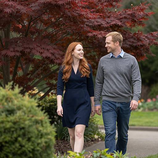 Couple Walking in Garden with Red Maple Tree