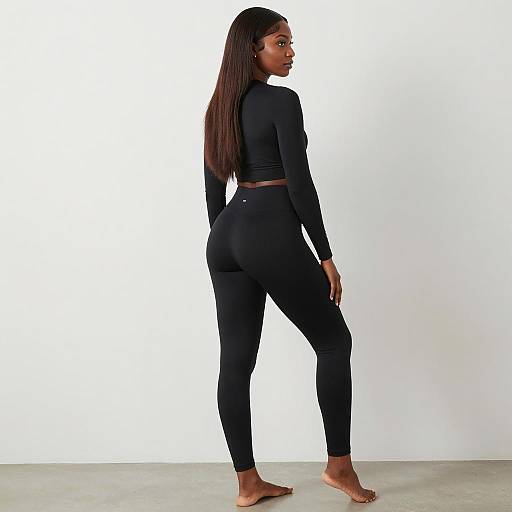 Black Woman in Black Athletic Wear Posing