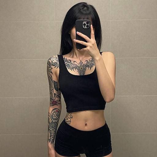 Tattooed Woman Mirror Selfie