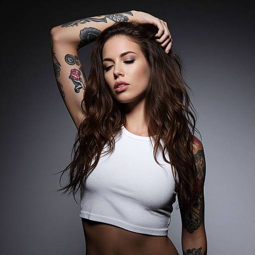 Tattooed Woman in Dramatic Lighting