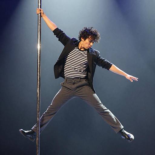 Male Pole Performer Mid-Air Shot