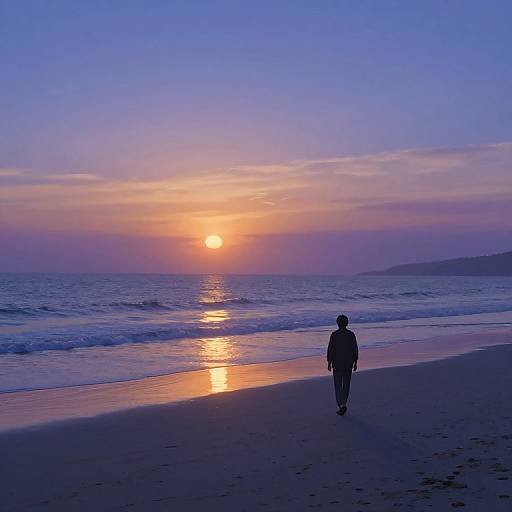 Silhouetted person walks along beach at sunset, with orange sun reflecting on calm ocean and purple-blue sky. Peaceful, serene scene.