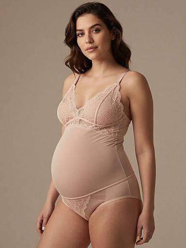 Elegant Pregnant Woman in Blush Lingerie Set