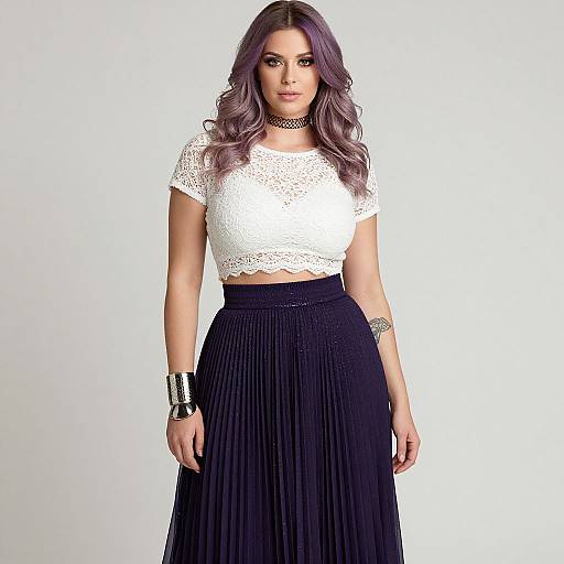 Photograph of a woman with purple hair, wearing a white lace crop top, black pleated skirt, black choker, and black bracelet, standing