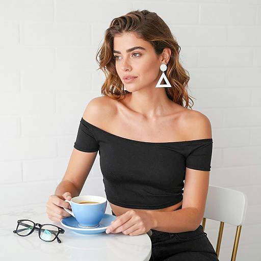 Woman in Black Crop Top Drinking Coffee