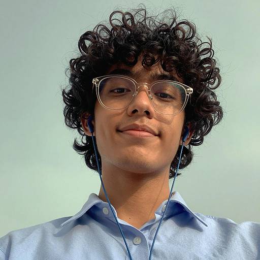 Curly Haired Portrait Against Green Sky
