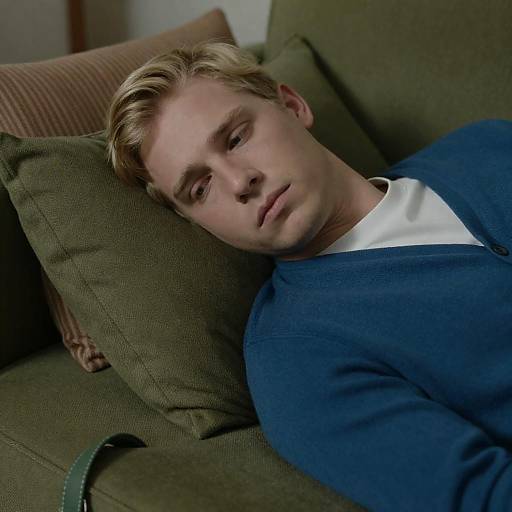 Melancholic Portrait on a Green Couch