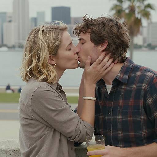 Romantic Outdoor Kiss with City Background