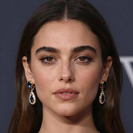 Portrait of Woman with Blue Earrings