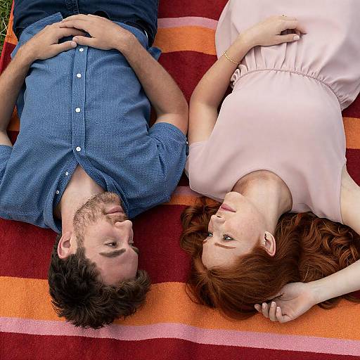 Couple Relaxing on Colorful Blanket Outdoors
