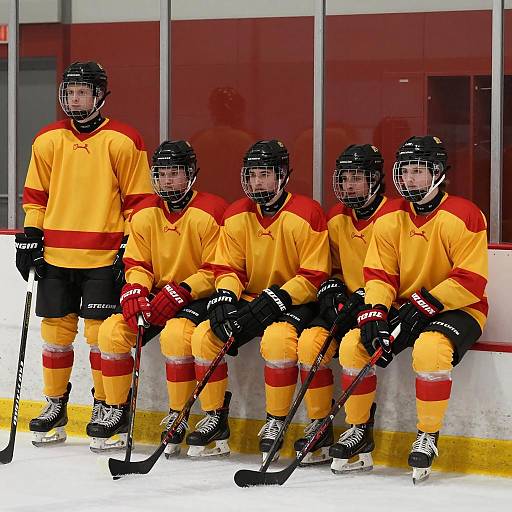 Focused Hockey Players in Bright Jerseys