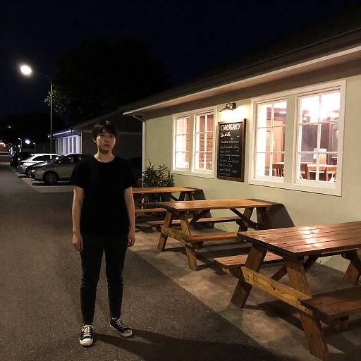 Nighttime Street Scene with Picnic Tables