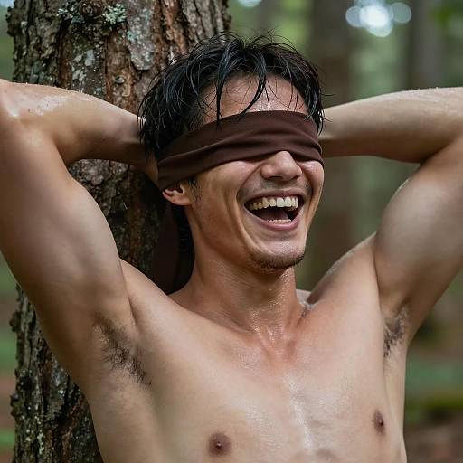 Laughing Man in Forest with Blindfold