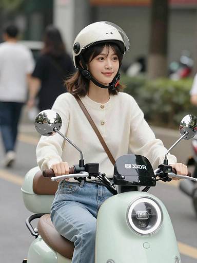 Young Woman Riding Mint Green Scooter in City
