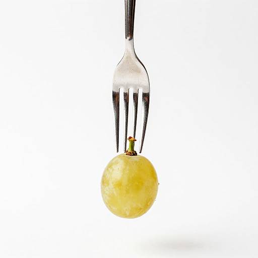 Minimalist High-Contrast Grape and Fork
