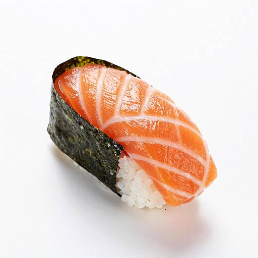 Photograph of a single, vibrant salmon nigiri sushi with a shiny, orange fish slice, white rice, and black seaweed wrapping.