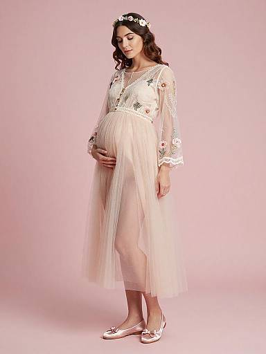Pregnant Woman in Ethereal Fairy Maternity Dress