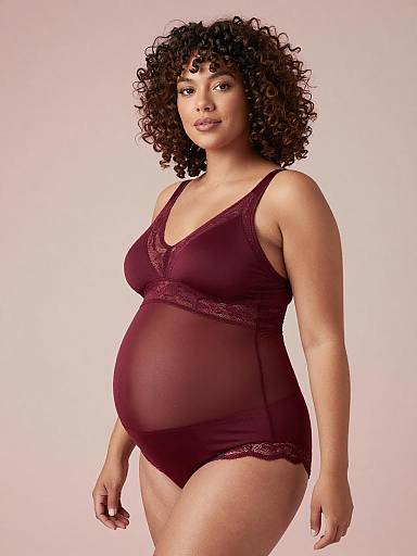 Soft Natural-Light Maternity Boudoir Portrait