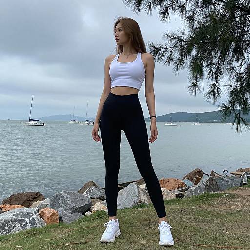 Woman in Athletic Wear by the Shore