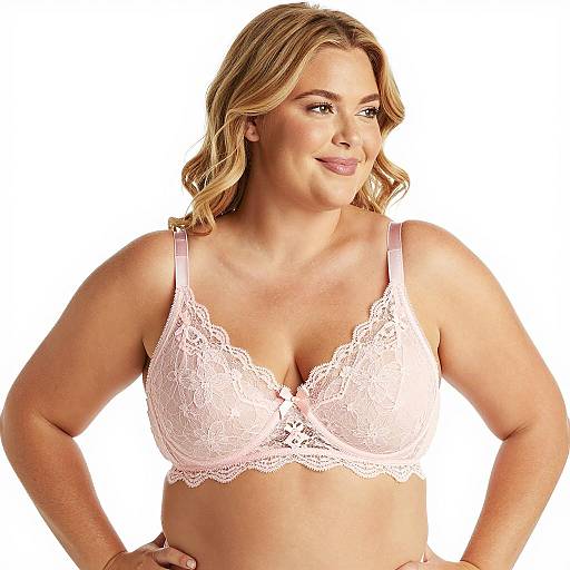 Plus-sized woman in pale pink lace bra