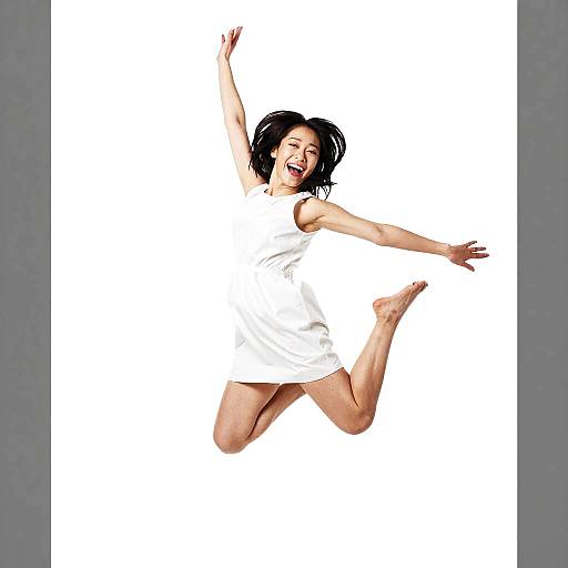 Joyful Asian Woman Mid-Jump