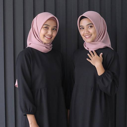 Smiling Asian Women in Pink Hijabs