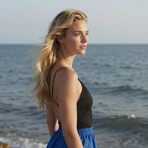 Elegant Woman by the Ocean Breeze