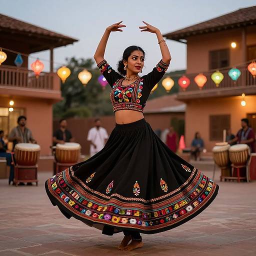 Photograph of a South Asian woman in a colorful traditional dance outfit, mid-spin, in a village square with string lights and drummers in the background
