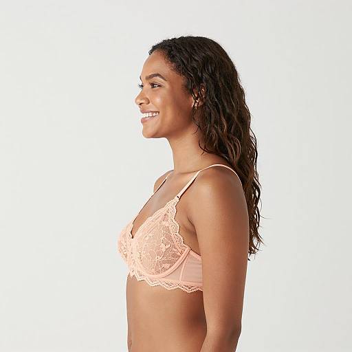 Smiling Woman in Peach Lace Bra