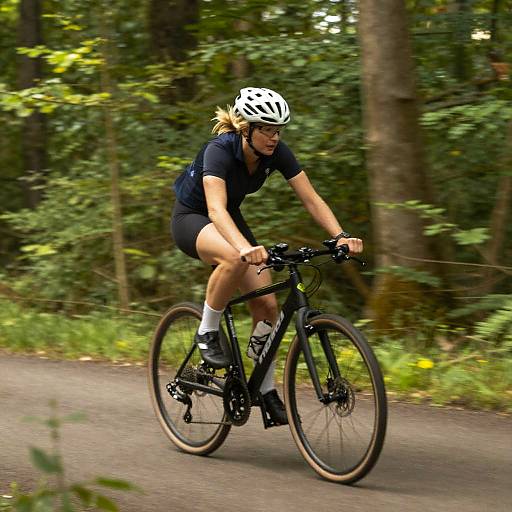 Blonde Tween Cycling Through Forest