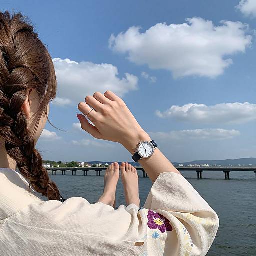 Woman in Kimono Wearing Wristwatch by Water