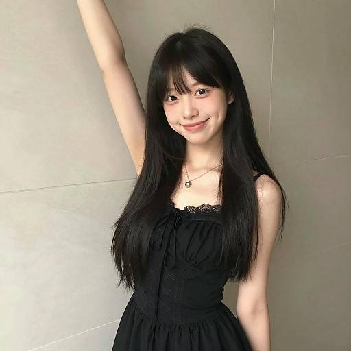 Smiling Young Woman in Black Dress