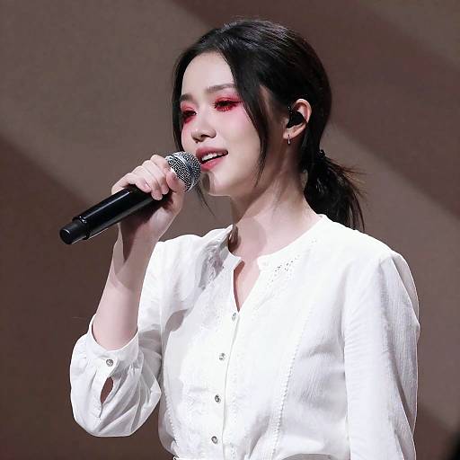 Pale-Skinned Singer with Red Makeup
