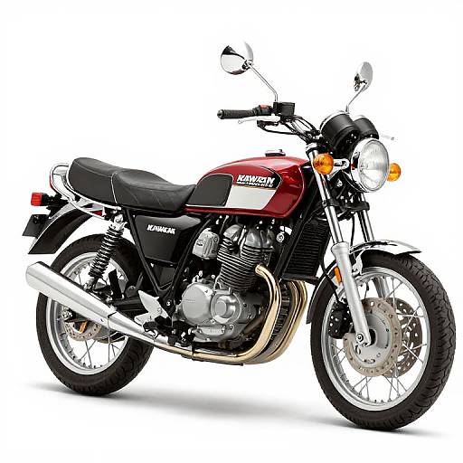 Photograph of a classic red and black Suzuki motorcycle with chrome details, black leather seat, and dual round headlights against a white background.