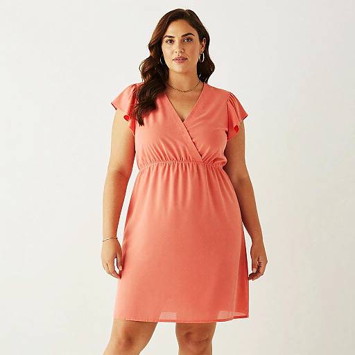 Plus Size Woman in Coral Dress
