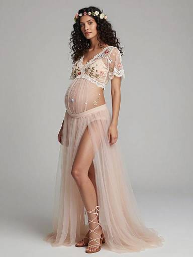 Pregnant Woman in Ethereal Sheer Lace Maternity Dress