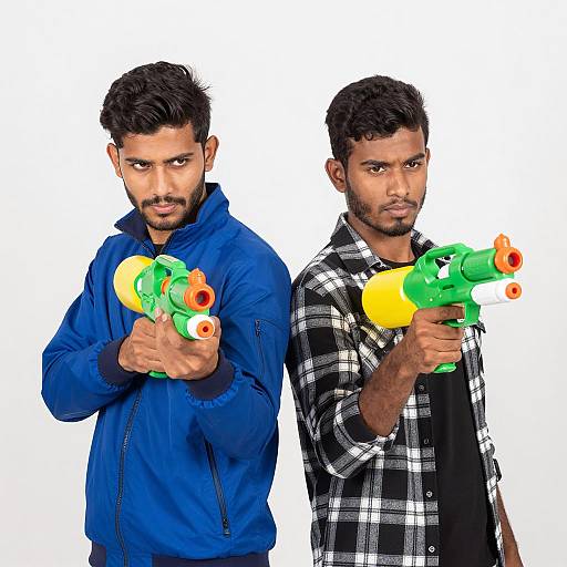 Young Men in Action with Water Guns