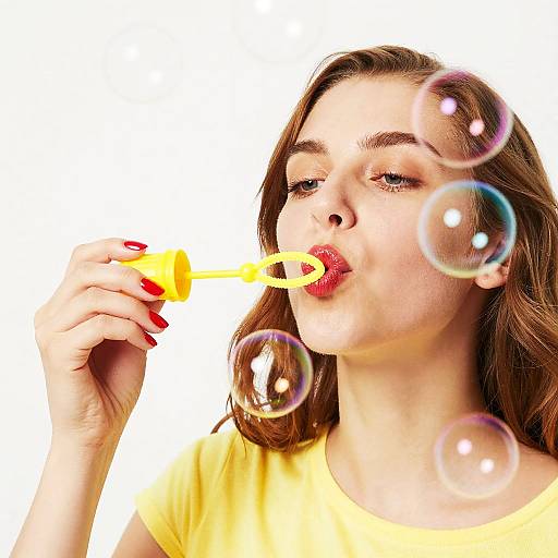 Young Woman Blowing Bubbles