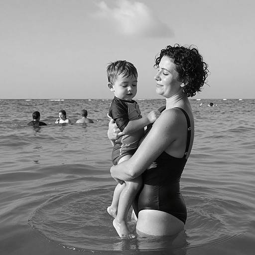 Mother Holding Son in Ocean