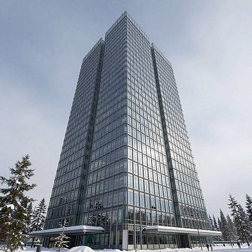 Neo-Futuristic Glass Tower in Snowy Forest