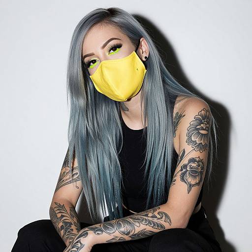 Edgy Tattooed Woman with Neon Makeup