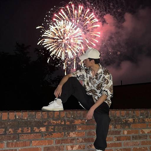Nighttime Vibes: Man with Cigarette and Fireworks