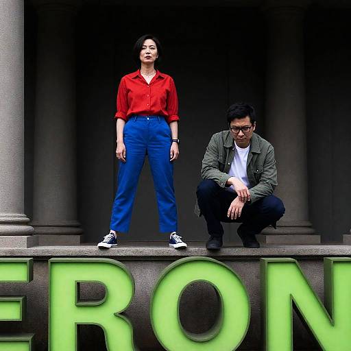 Confident Duo on a Building Ledge