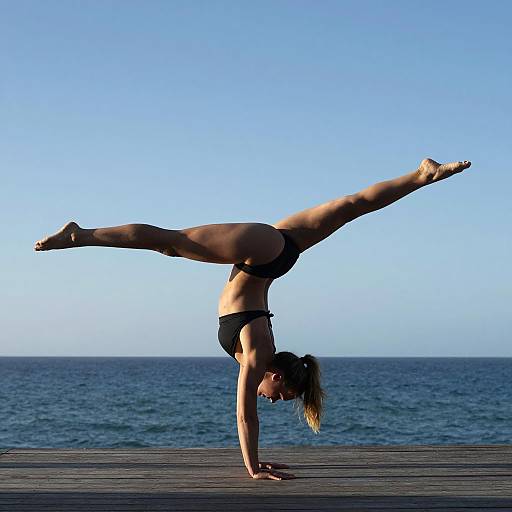 Graceful Handstand on Oceanfront Deck