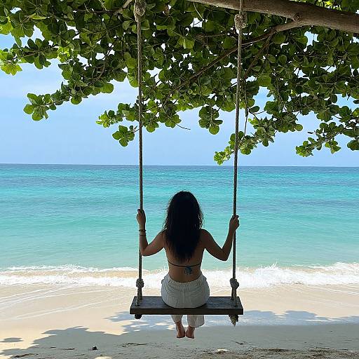 Woman on Wooden Swing by Ocean