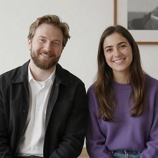 Smiling man and woman sitting together