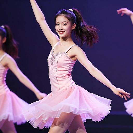 Smiling Dancer in Pink Stage Dress