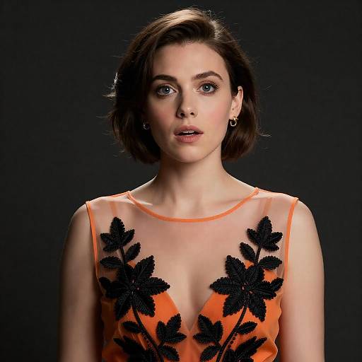 Surprised Woman in Orange Sheer Dress