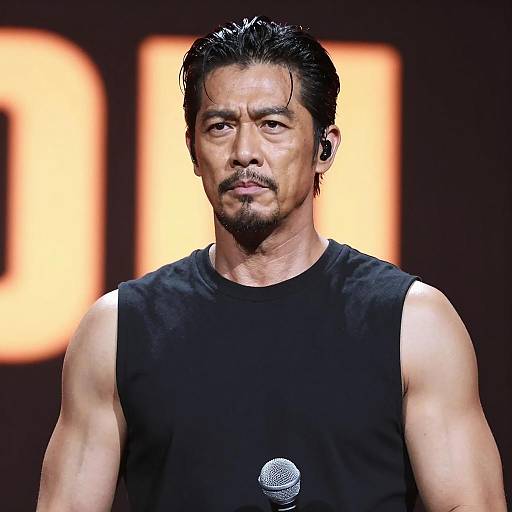 Intense Vocalist Against Glowing Background