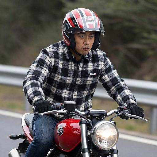 Man Riding Red Motorcycle with Helmet and Plaid Jacket